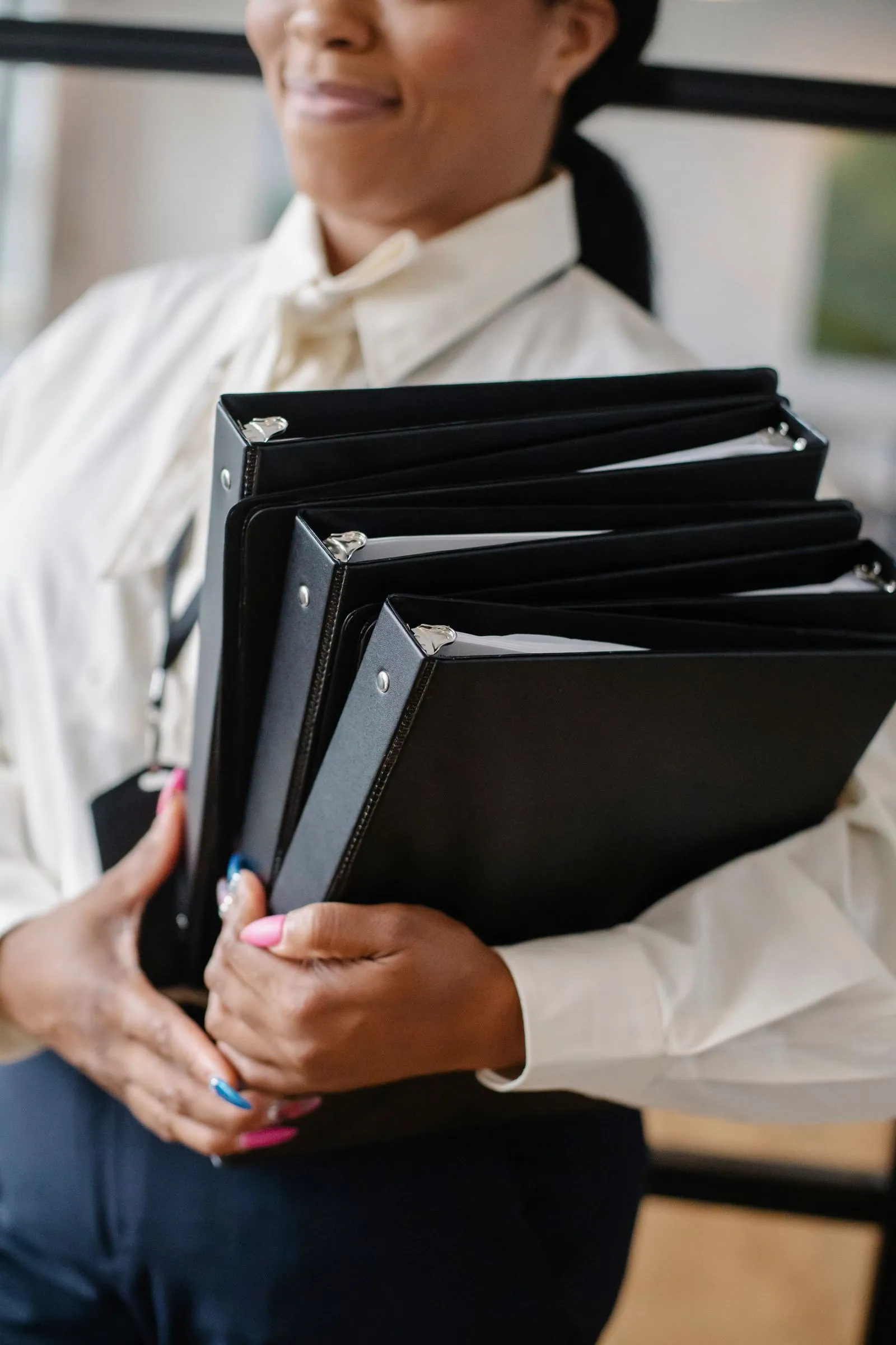 Row of archived accounting files and record binders