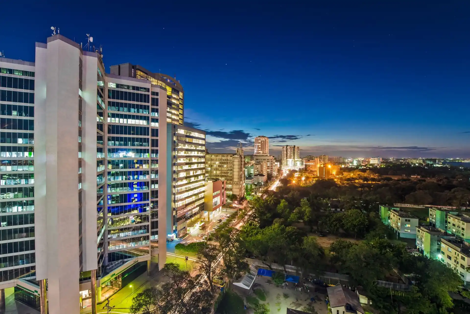 Modern high-rise towers in the Dar es Salaam central business district at dusk