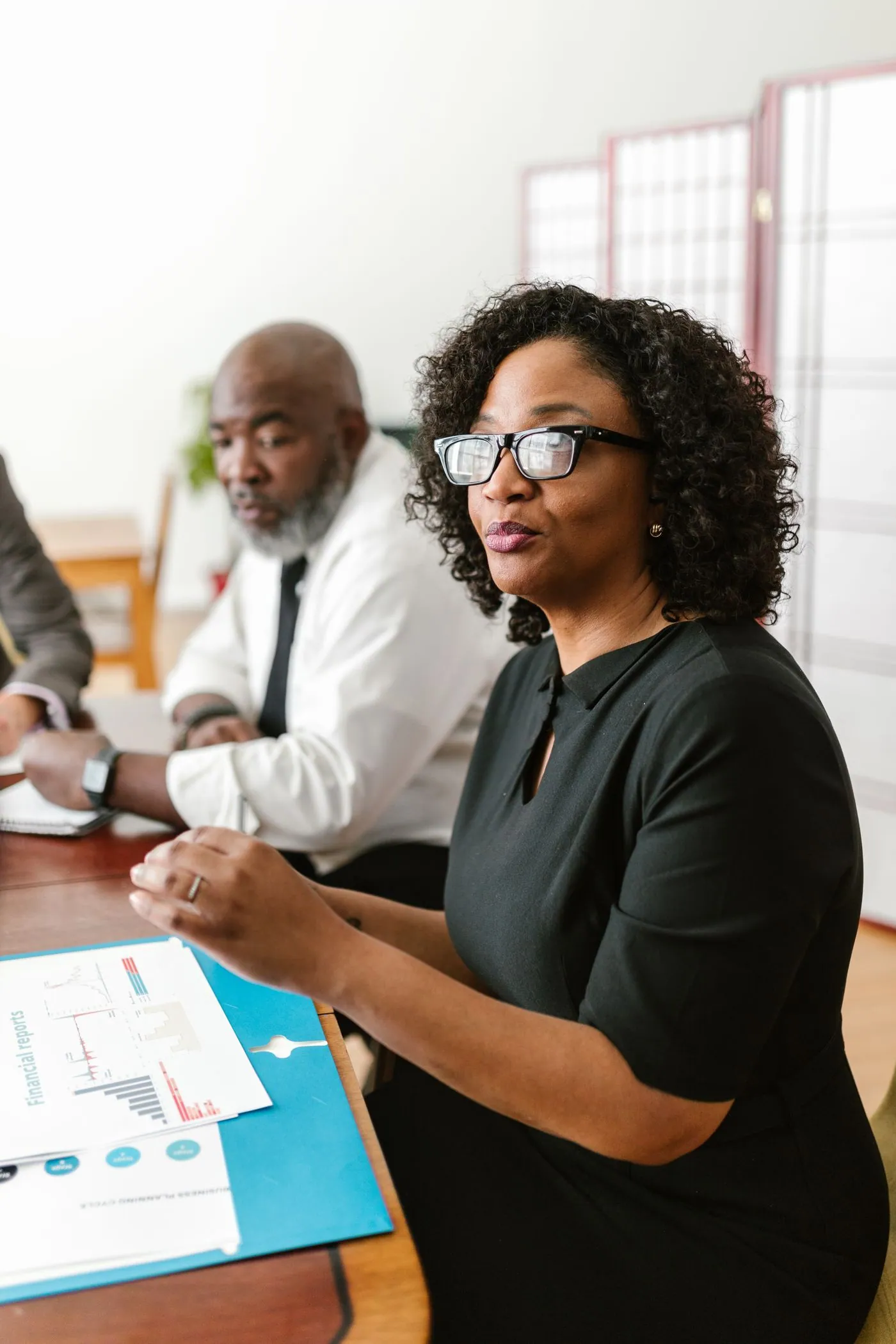 Two colleagues in conversation during a working meeting